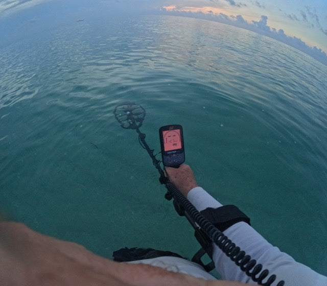 Metal Detecting The Beach