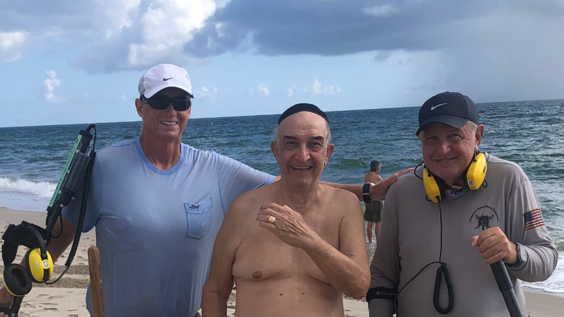 Metal detecting ring return on the beach
